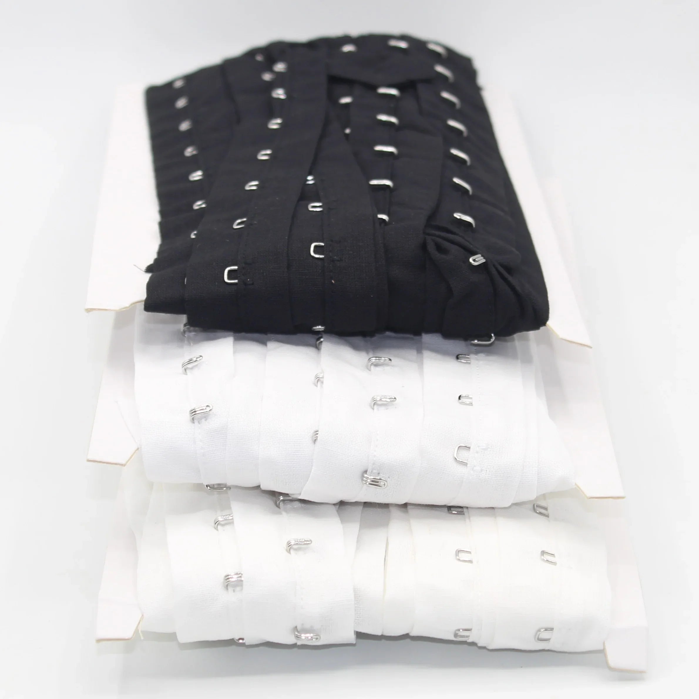 5 meters Cotton Hook and Eye Tape, 25mm wide, Space between each Hooks 20mm, available in Black, White or Offwhite #RUB1302 - ACCESSOIRES LEDUC BV