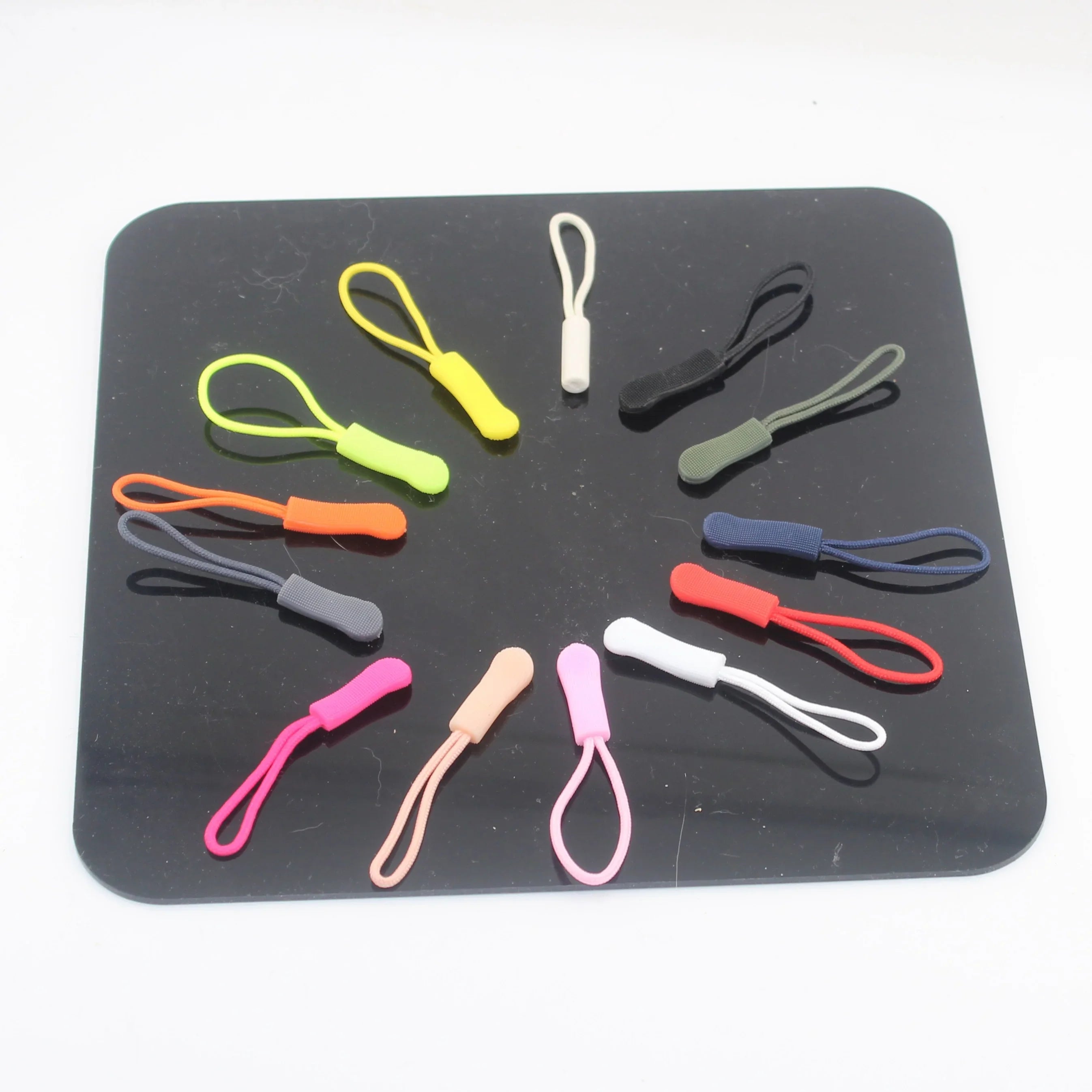 Zip Pullers, available in different colours, 60mm - ACCESSOIRES LEDUC BV