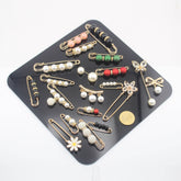 Sets of Pins, Broches, Decorative articles with Pearls, Beads etc