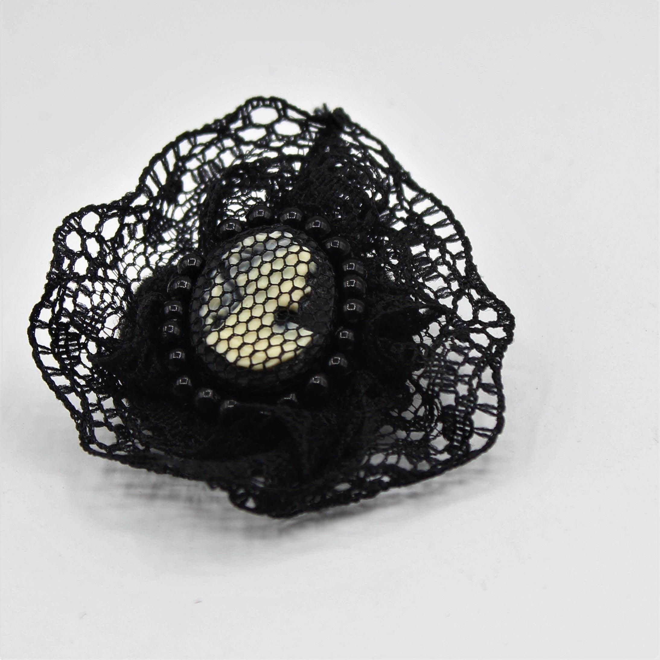 Vintage Black fabric decorative Brooch with a figure of a lady in the center with a pin - 45 mm - ACCESSOIRES LEDUC BV