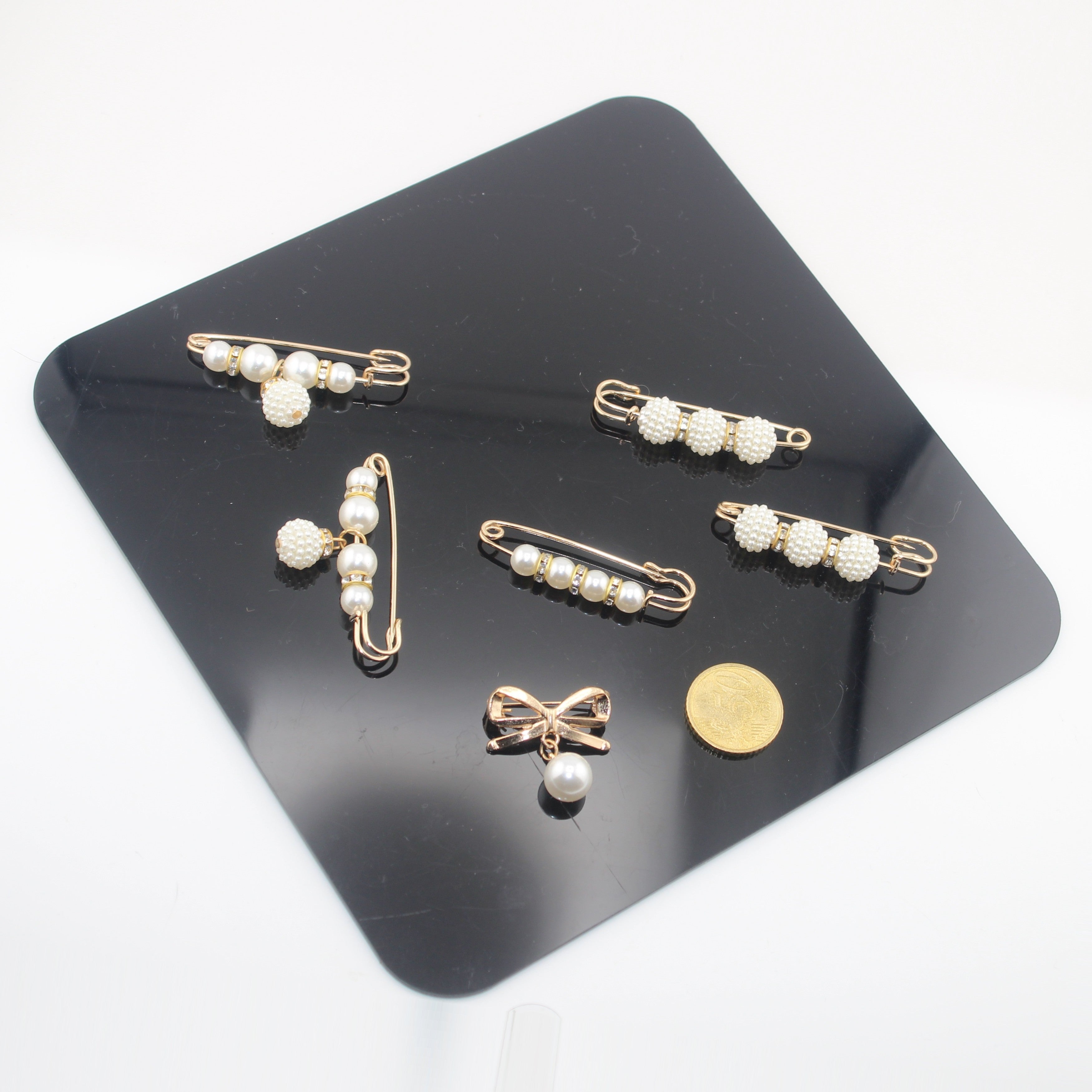 Sets of Pins, Broches, Decorative articles with Pearls, Beads etc