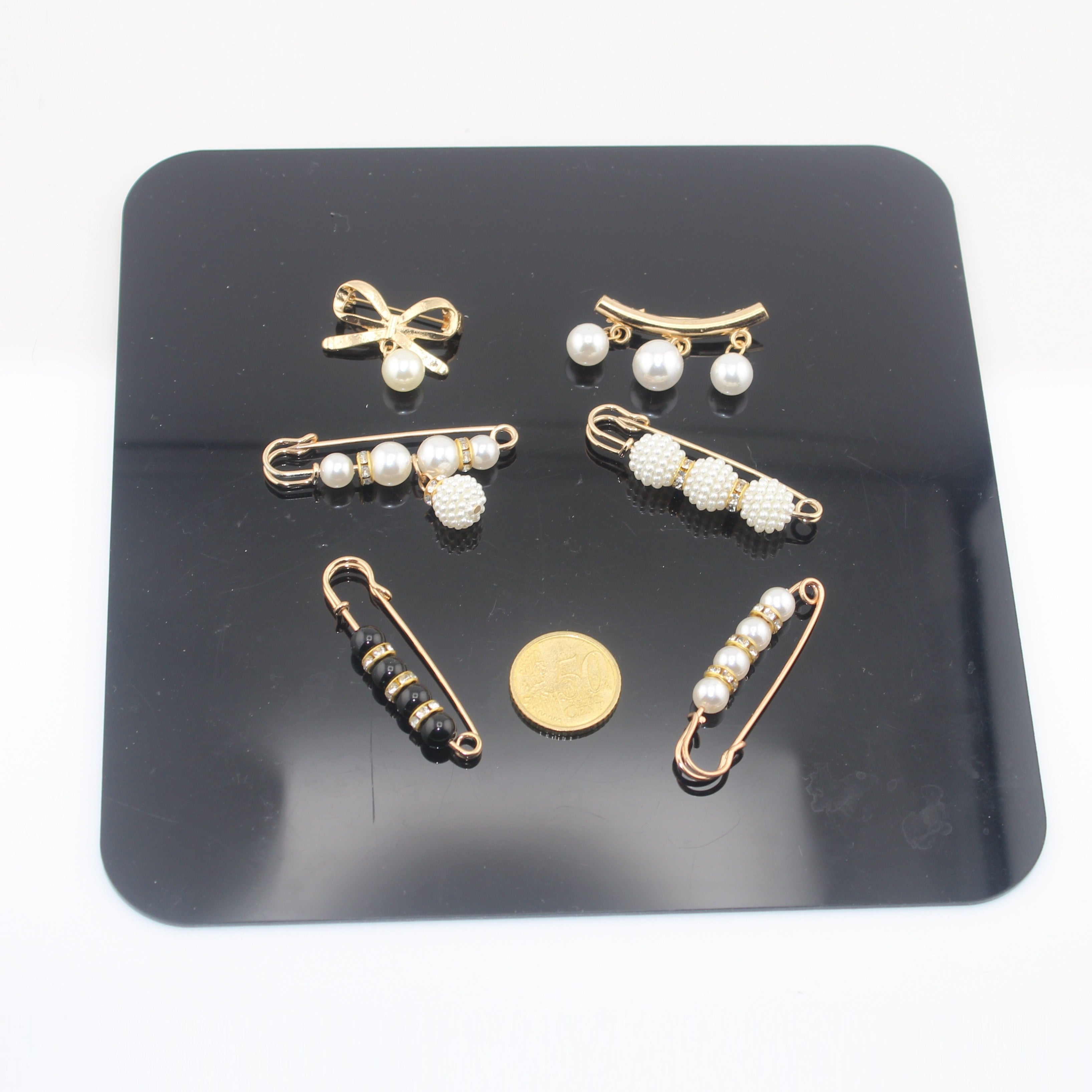 Sets of Pins, Broches, Decorative articles with Pearls, Beads etc
