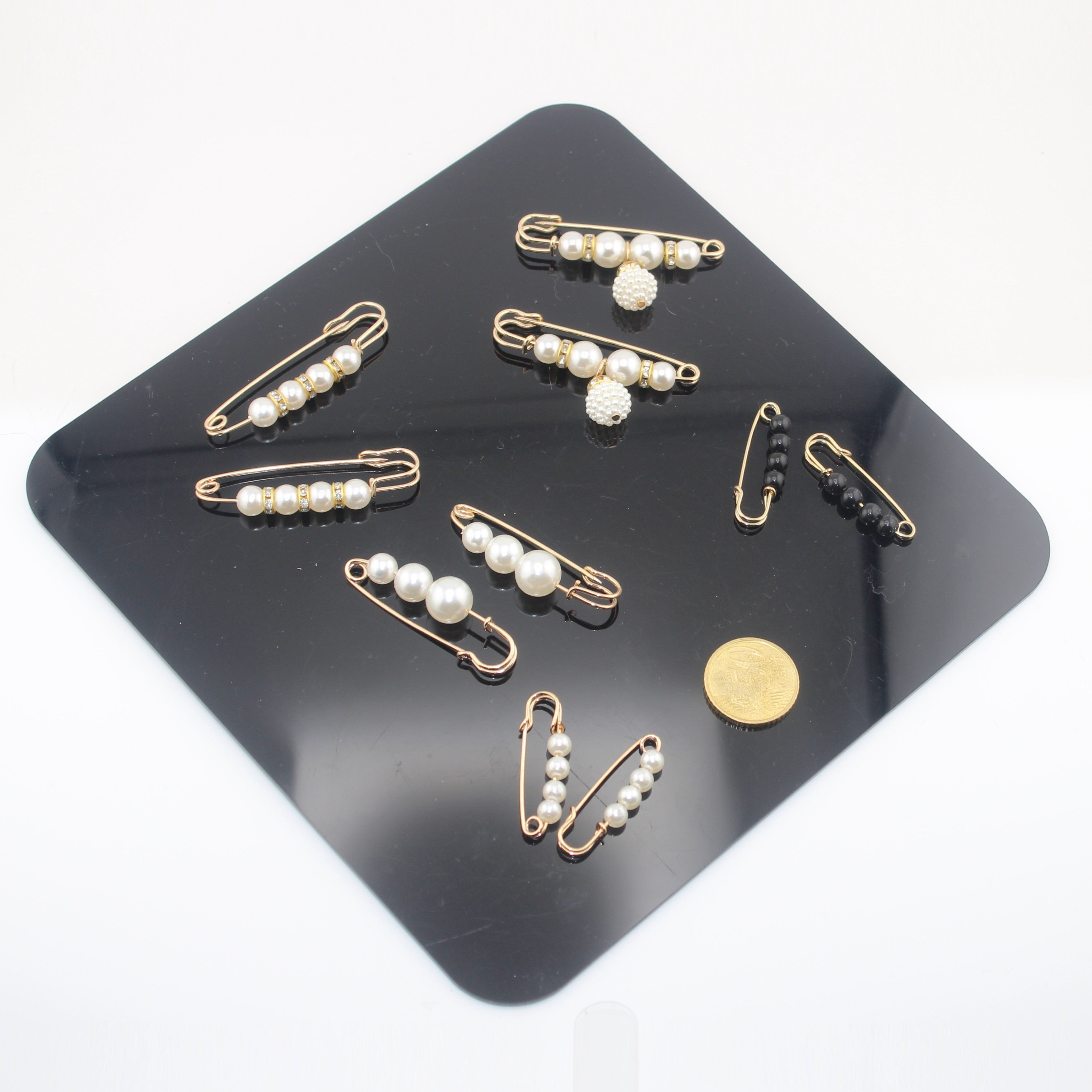 Sets of Pins, Broches, Decorative articles with Pearls, Beads etc