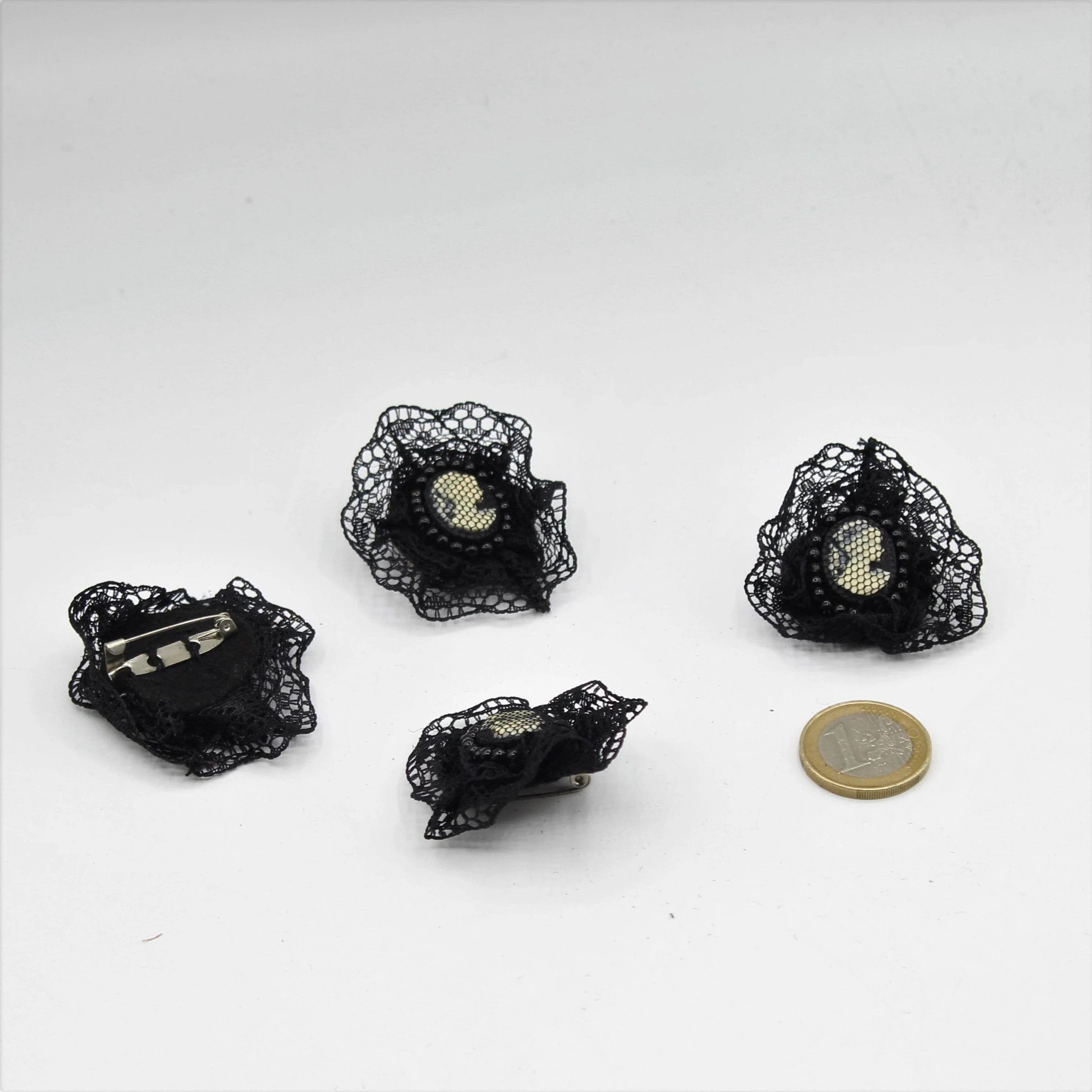 Vintage Black fabric decorative Brooch with a figure of a lady in the center with a pin - 45 mm - ACCESSOIRES LEDUC BV