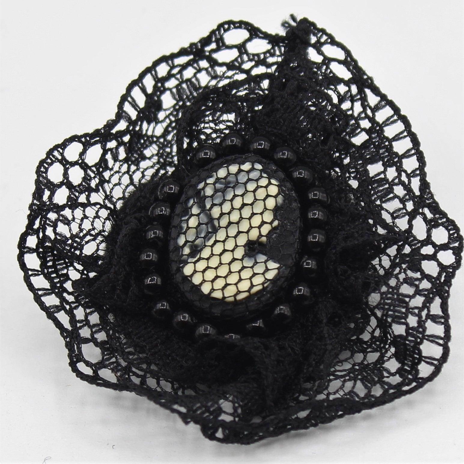 Vintage Black fabric decorative Brooch with a figure of a lady in the center with a pin - 45 mm - ACCESSOIRES LEDUC BV