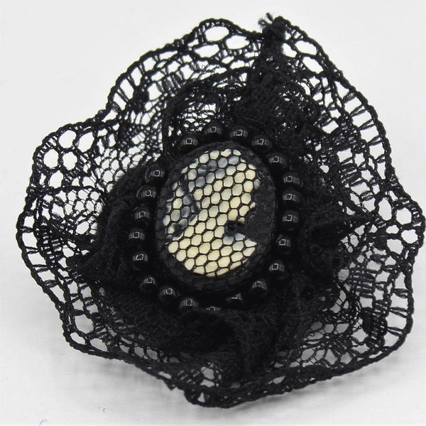 Vintage Black fabric decorative Brooch with a figure of a lady in the center with a pin - 45 mm - ACCESSOIRES LEDUC BV