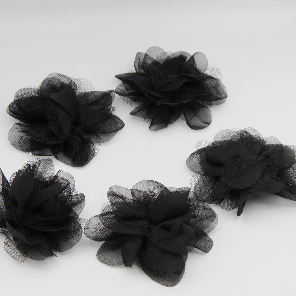 Black flower best sale brooch