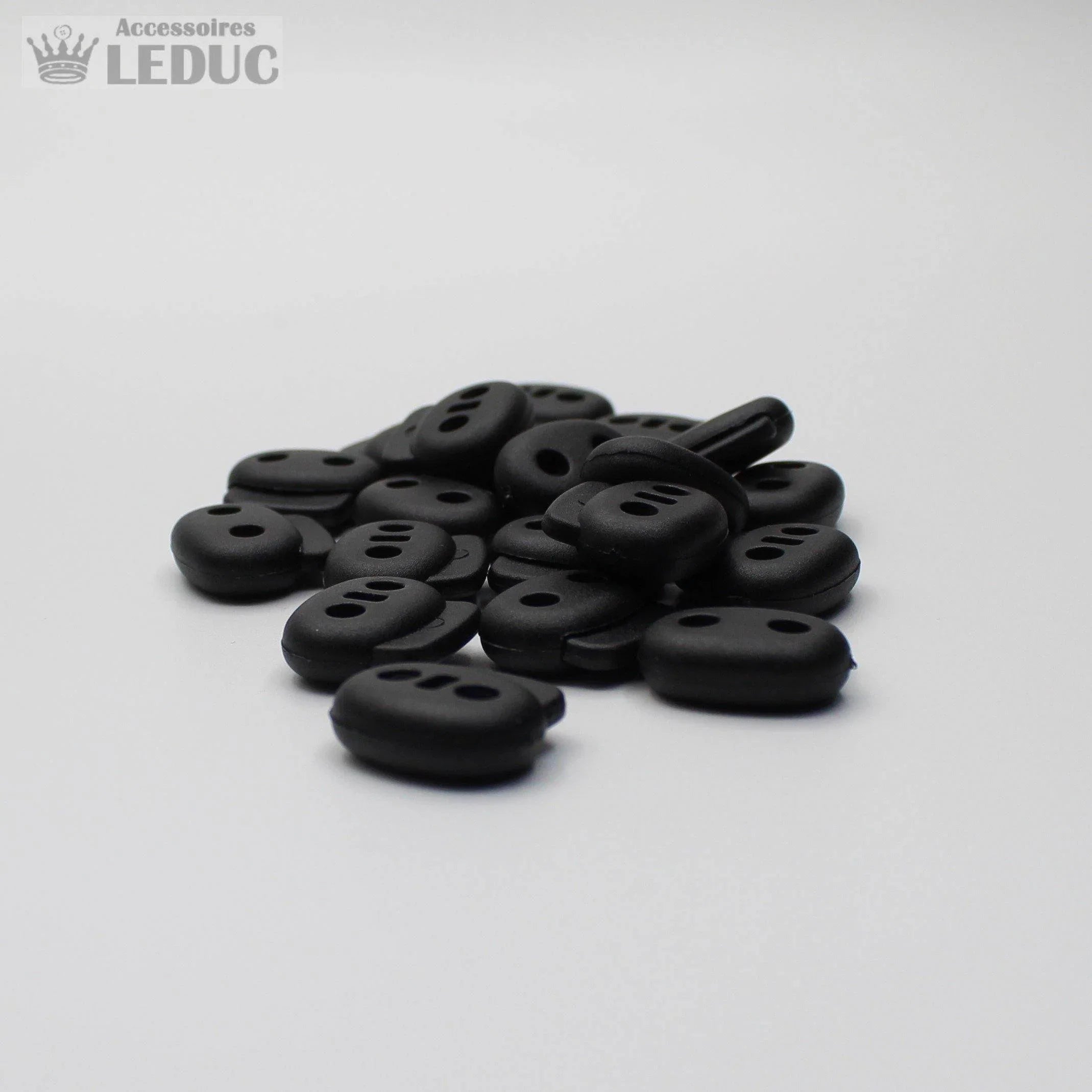 20 Cord Stoppers Black or White - ACCESSOIRES LEDUC BV